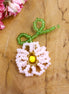 Charm Perle Blume - rosa Blume mit gelbem Herz