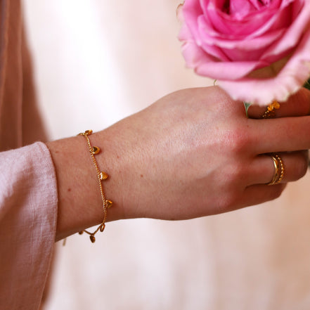 Stainless steel bracelet - with small heart charms