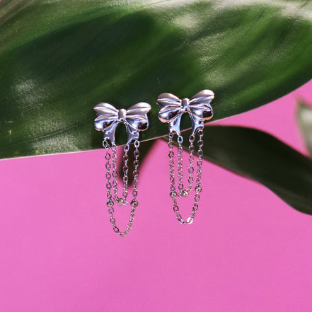 Stainless steel bow stud earrings with silver jasseron