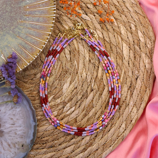 Kralenketting - paarstinten met schelpjes