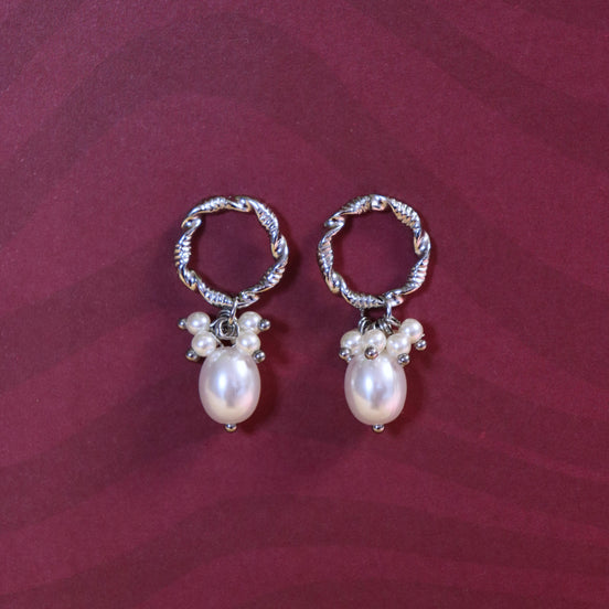 Stainless steel oorstekers met pareltjes zilver