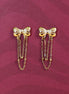 Stainless steel bow stud earrings with gold jasseron
