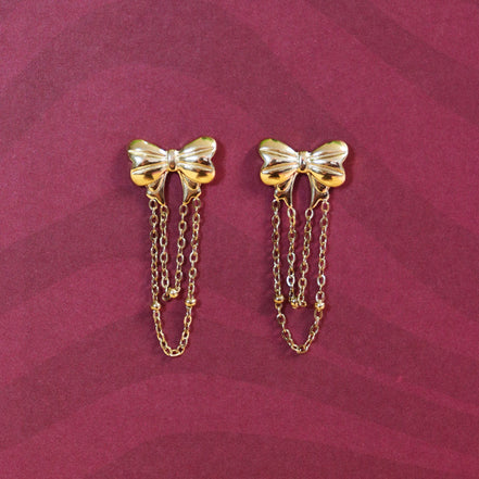 Stainless steel bow stud earrings with gold jasseron