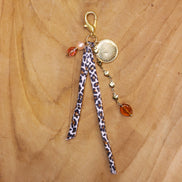 Bag charm - met bruintinten en hartbedel