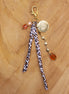 Bag charm - met bruintinten en hartbedel
