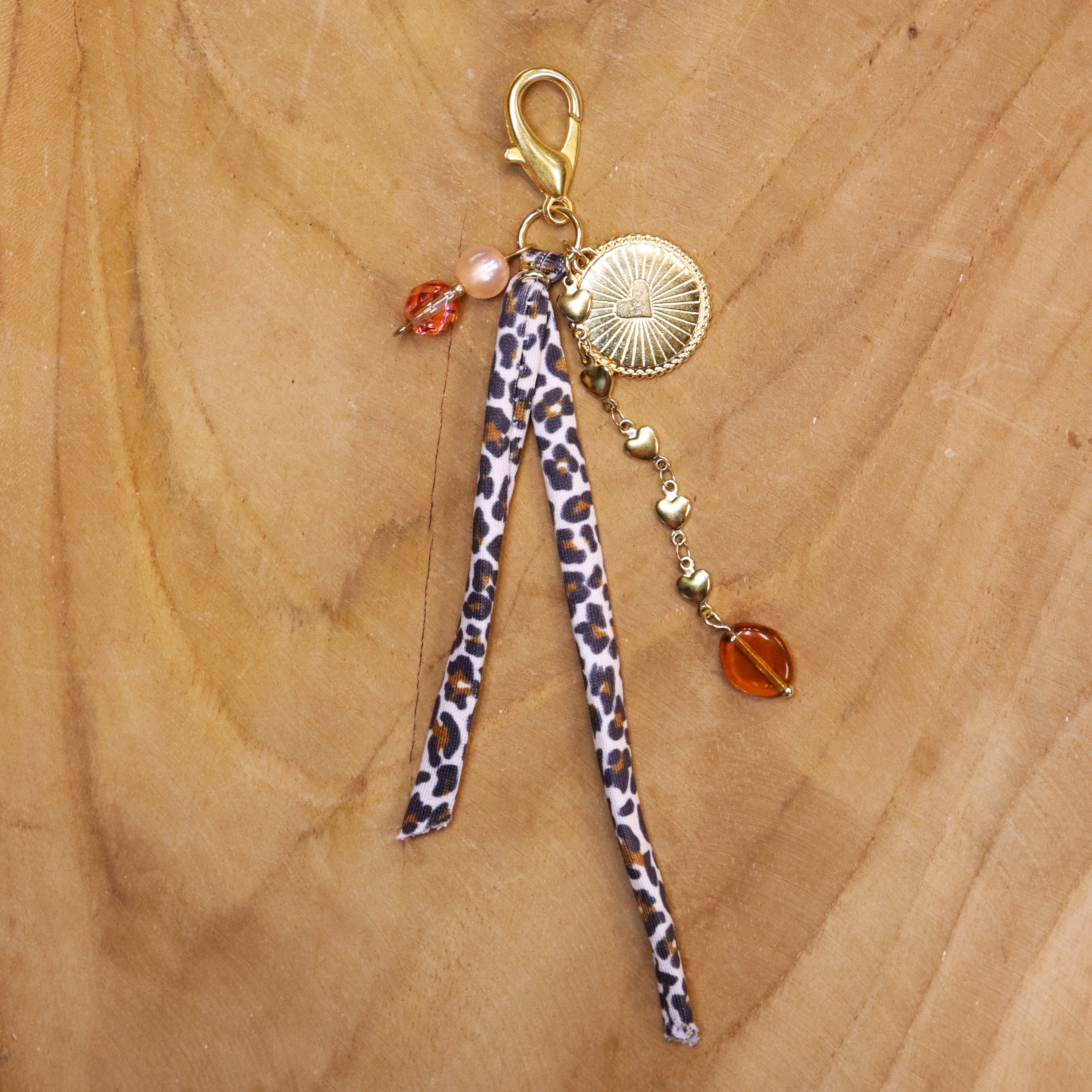 Bag charm - met bruintinten en hartbedel