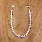 Telefoonkoord - parels goud