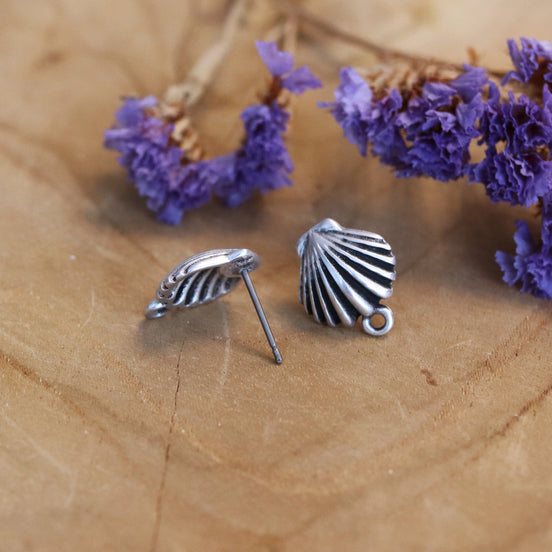 Oorsteker DQ zilver schelp met oogje