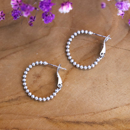 Oorring DQ zilver met bolletjes