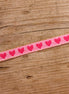 Ribbon with hearts pink