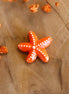 Bead orange - ceramic starfish