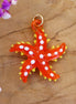 Necklace charm - glass starfish orange