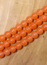 Gekleurde glaskralen per streng - oranje