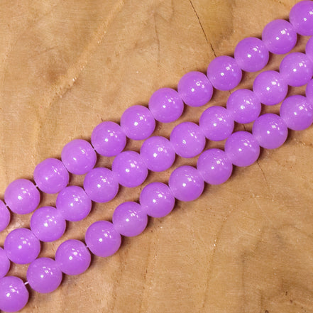 Gekleurde glaskralen per streng - lila