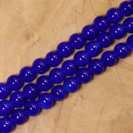 Gekleurde glaskralen per streng - donkerblauw