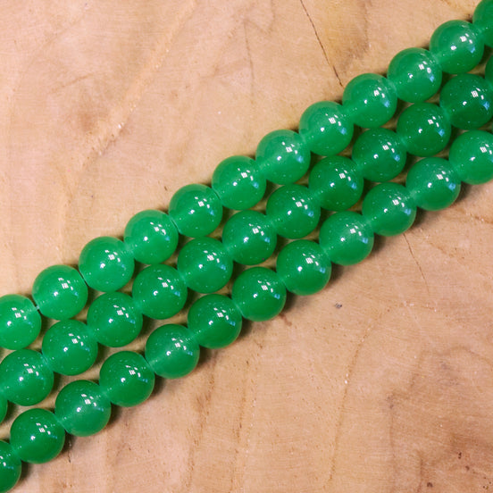 Gekleurde glaskralen per streng - groen