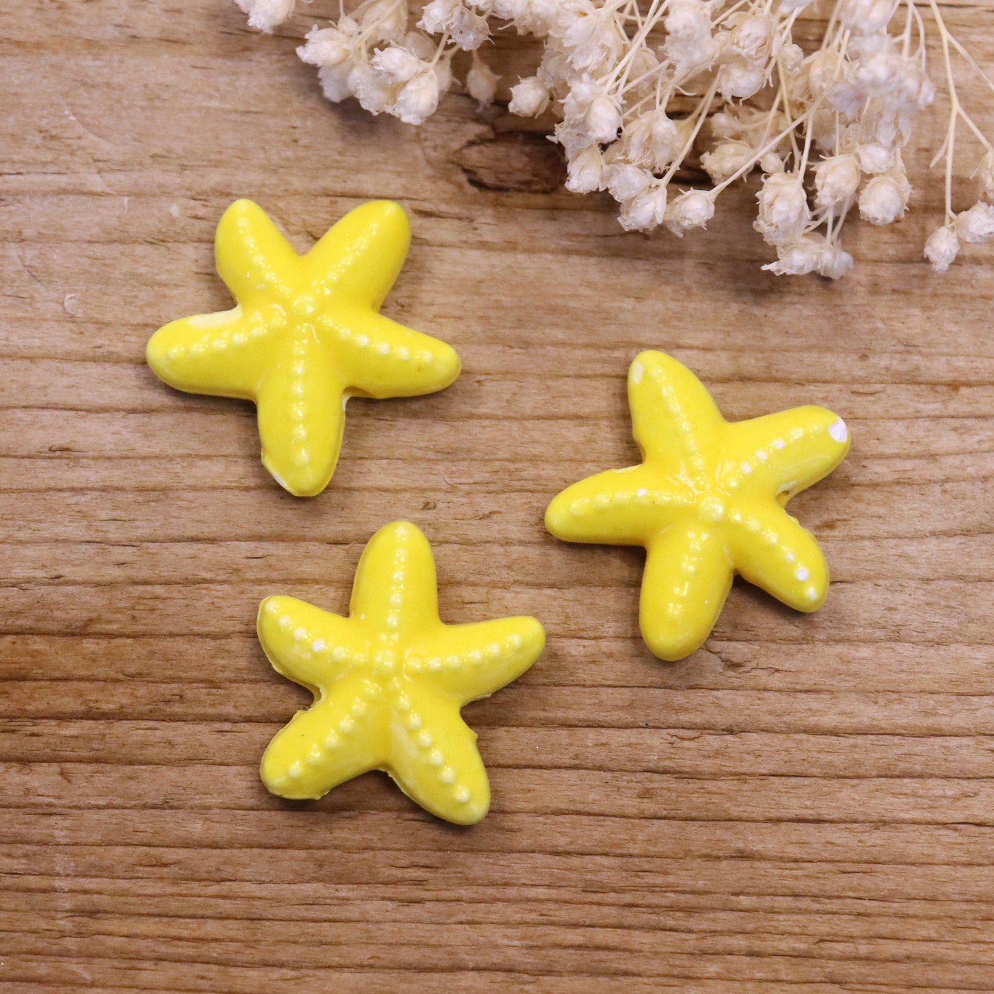 Bead yellow - ceramic starfish