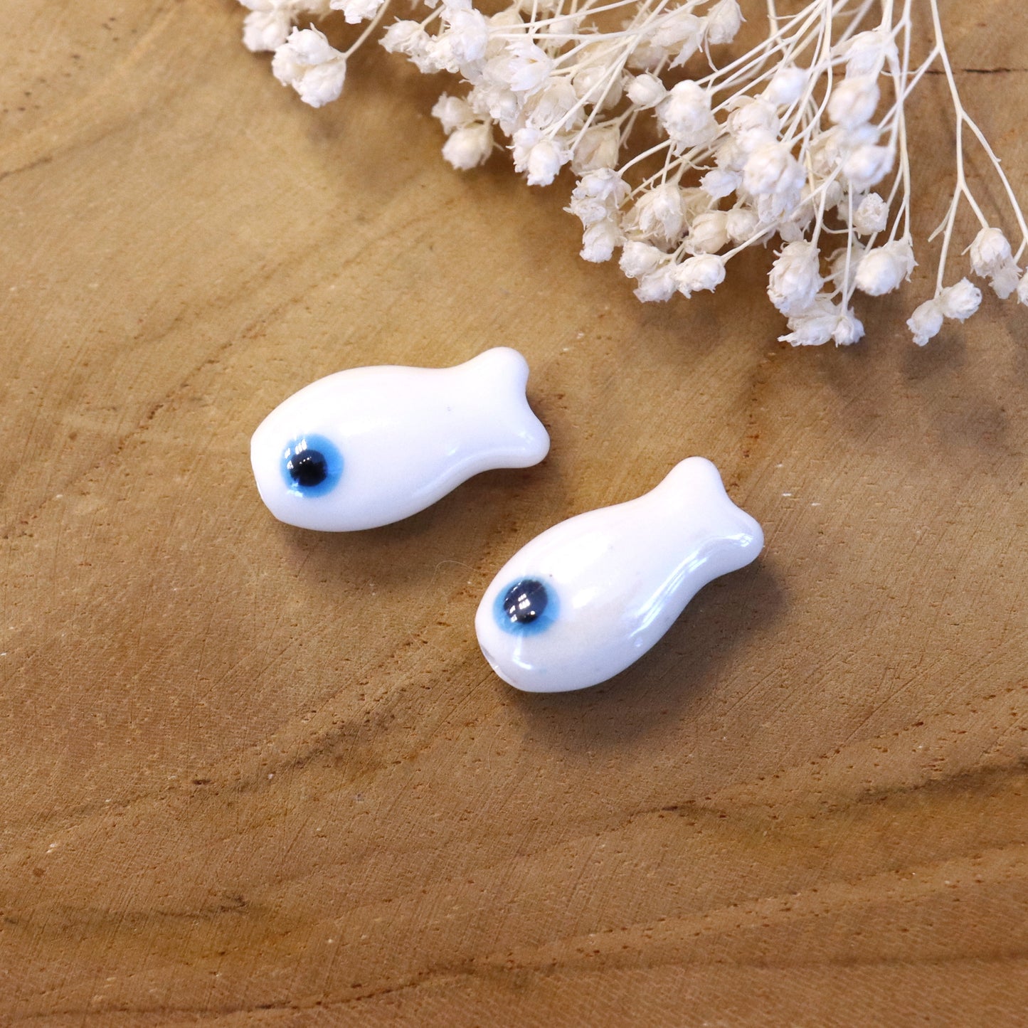 White bead - ceramic fish