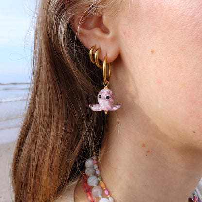 Stainless steel earrings with a little squid.