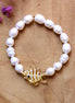 Parel armband met glazen vis