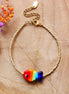 Kralenarmband - goud met regenboogvisje