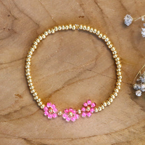 Armband met bloemen - fuchsia goud