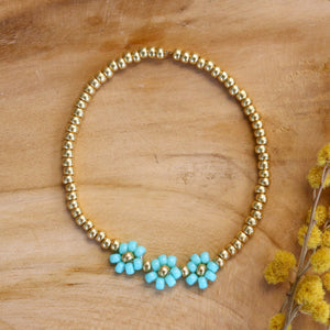Armband met bloemen - turquoise goud