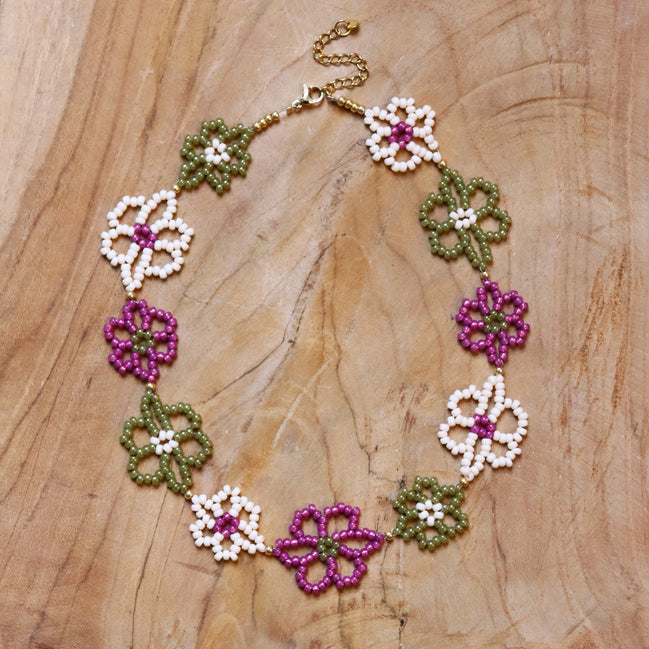 Kralenketting met bloemen - goud