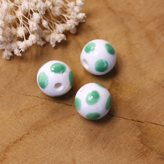 Kraal wit - porselein met groene stippen