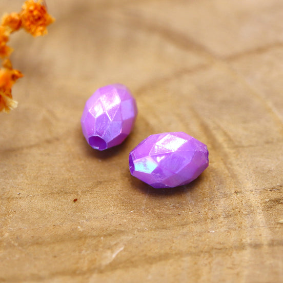 Perle lila - facettiert oval