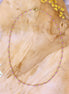 Ketting stainless steel - roze bolletjes