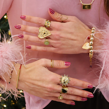 Kralenarmband - goud met bedels en jasseron