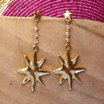 Statement oorbellen - ster met facetkralen