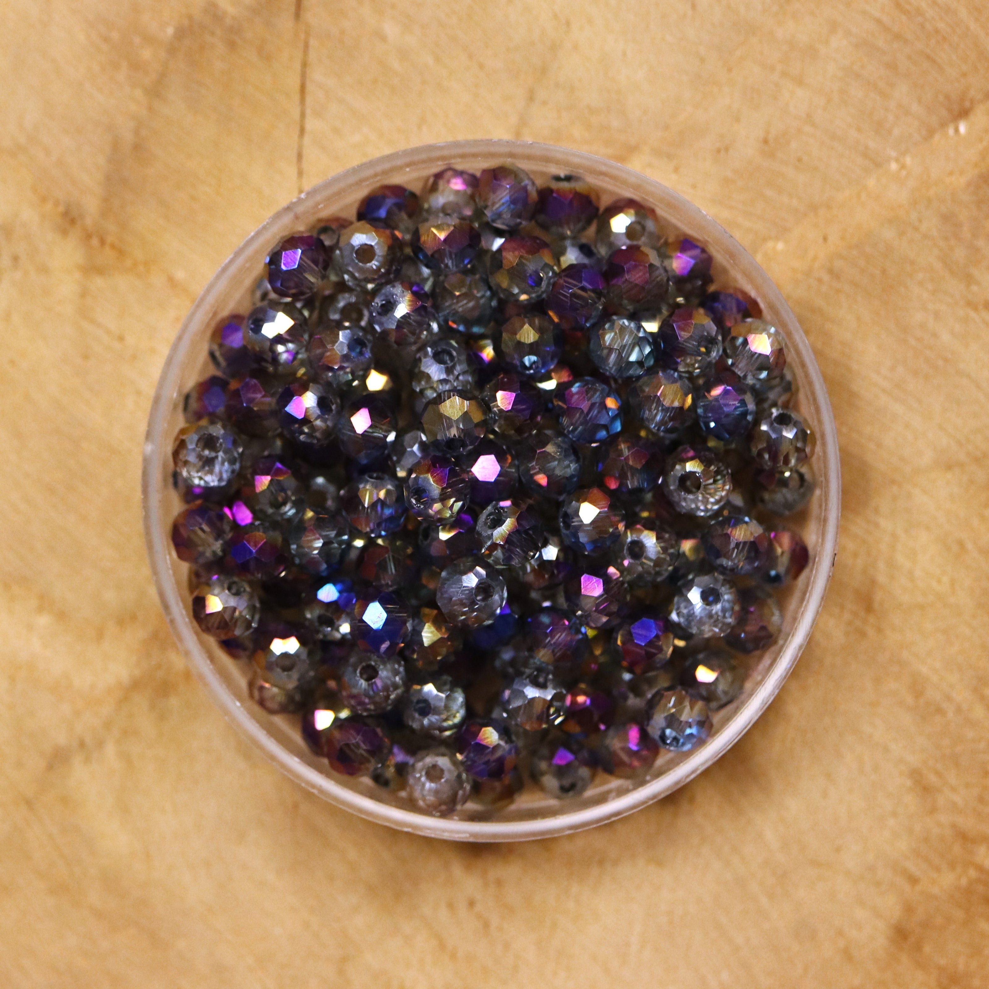 Rondel facetkralen 3x4 mm - Grey diamond coating purple