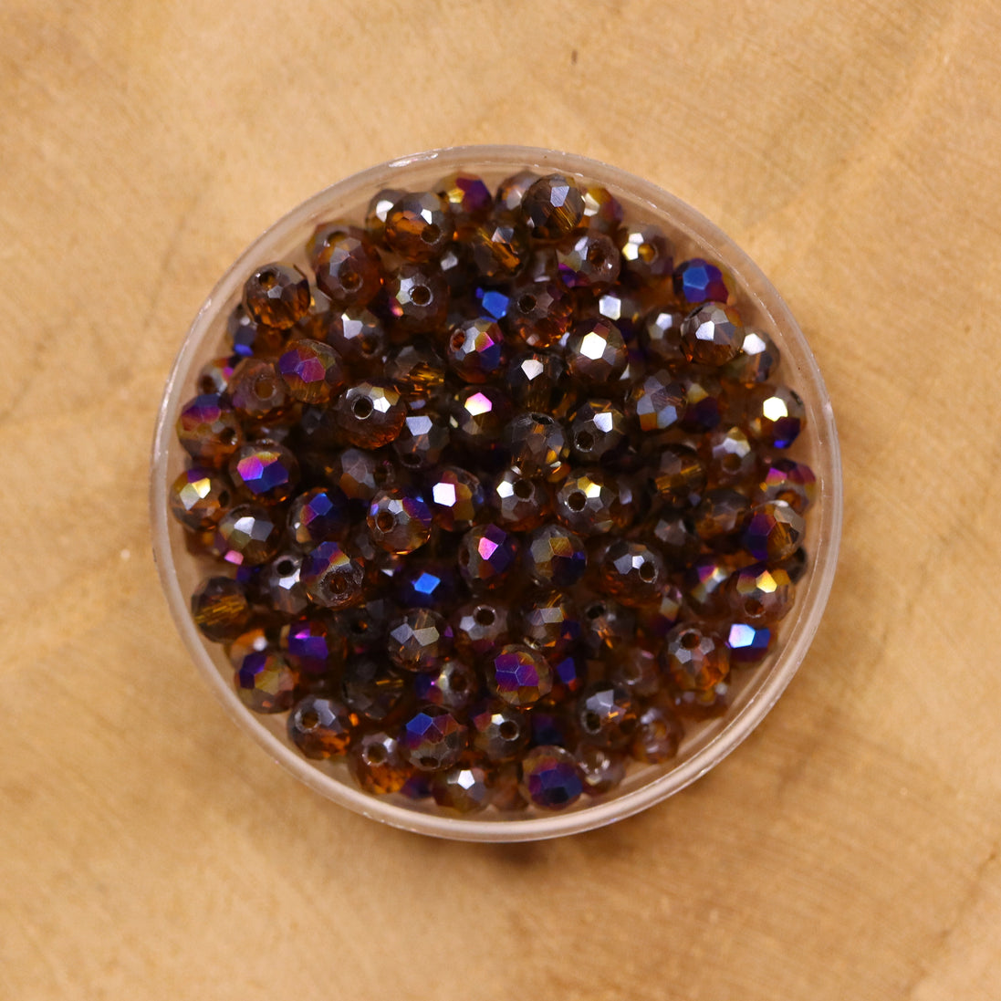 Rondel facetkralen 3x4 mm - Brown diamond coating purple