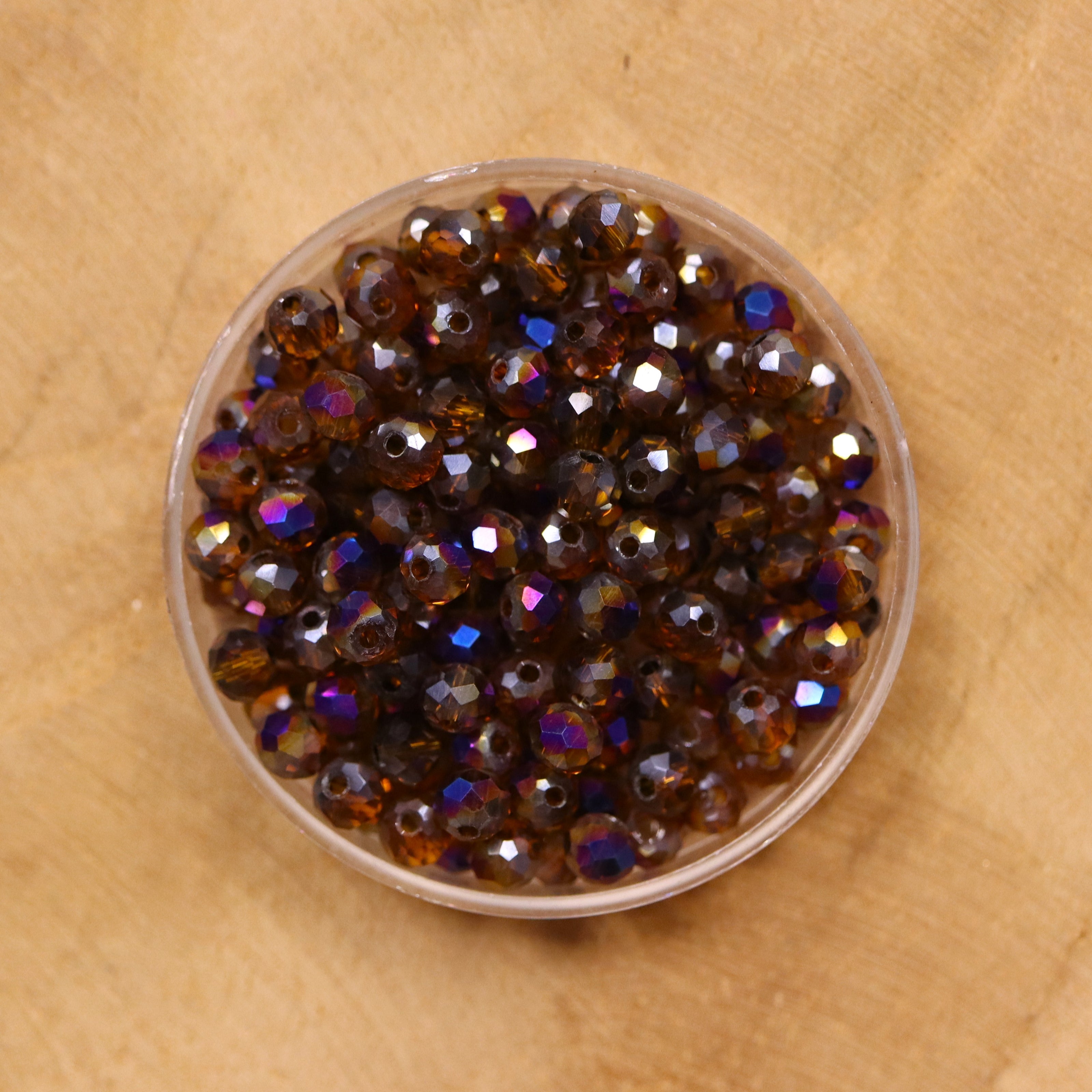 Rondel facetkralen 3x4 mm - Brown diamond coating purple