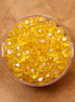 Rondel facetkralen 4x6 mm - Golden yellow