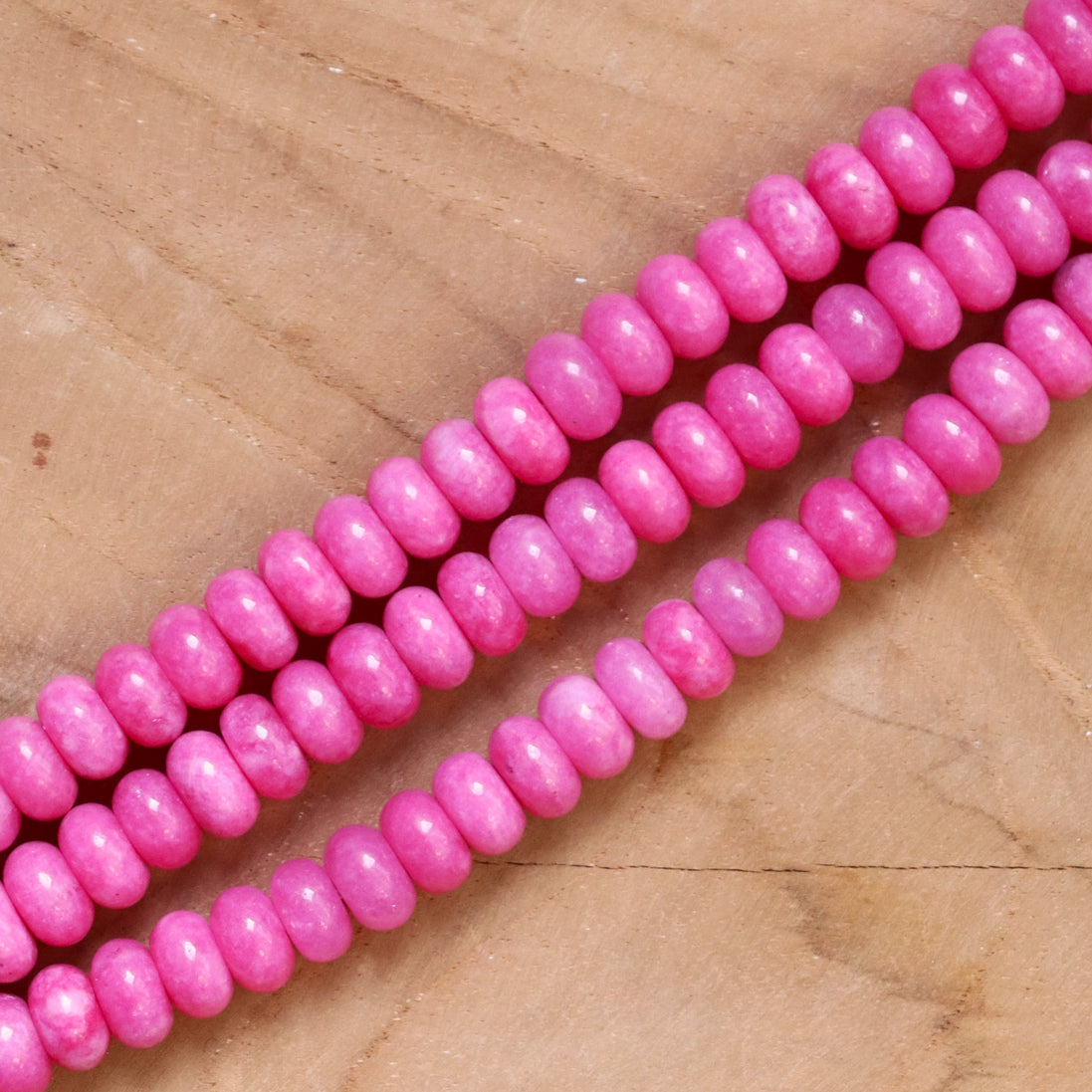 Kralenstreng rondellen dyed jade - pink sugar