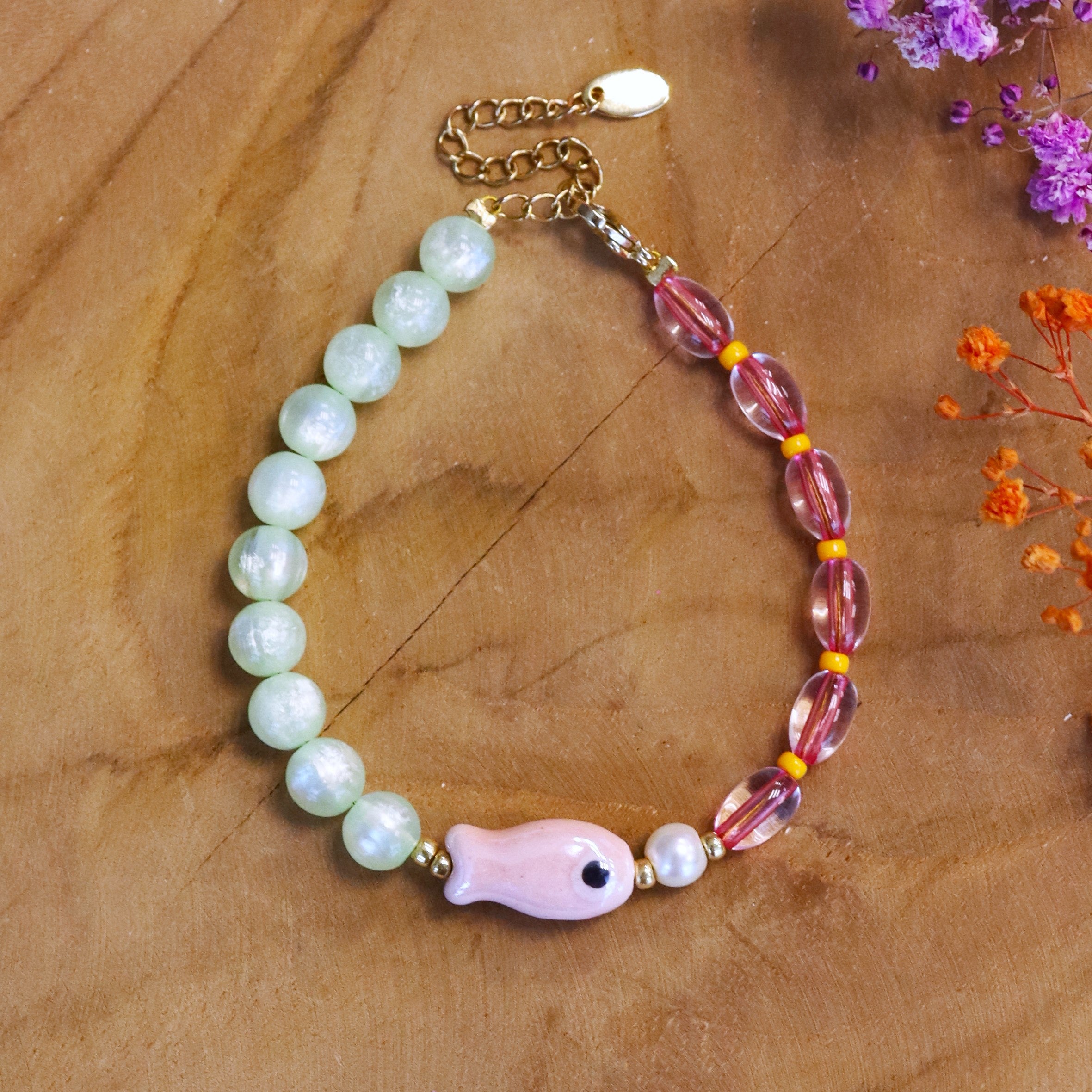 Bracelet with ceramic fish green-pink