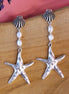 Statement oorbellen zilver - zeester met parels