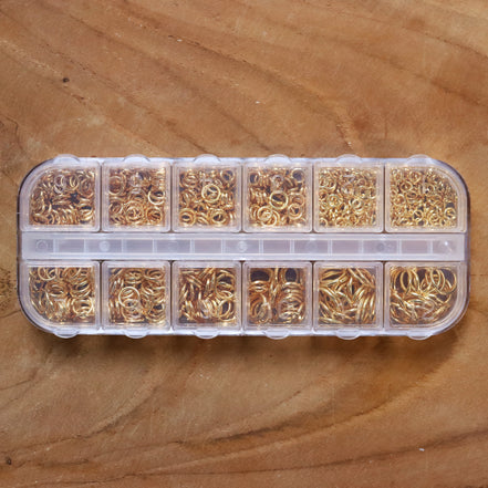 Gevulde kralendoos open ringetjes brass - goud