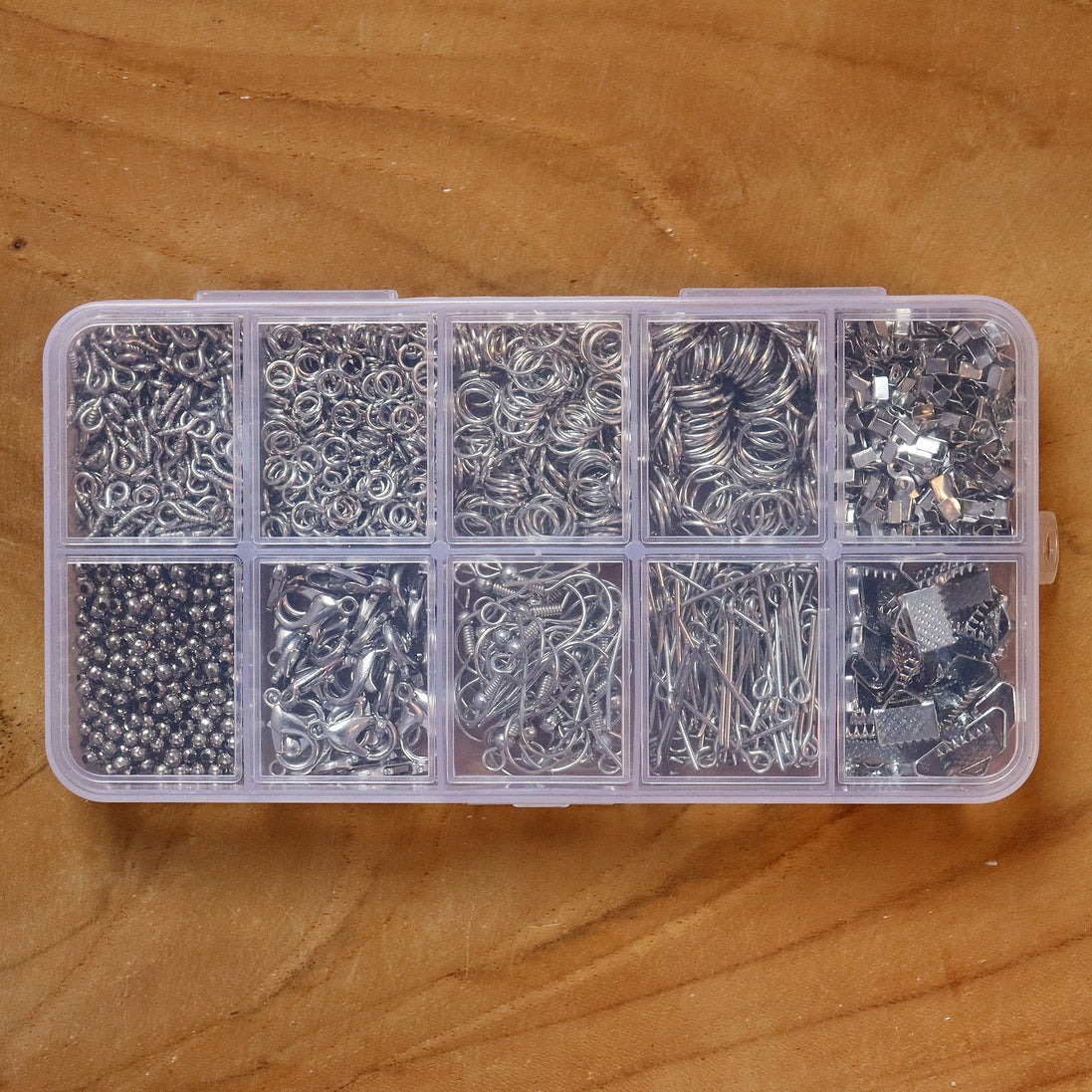 Gevulde kralendoos benodigdheden zinklegering  - zilver