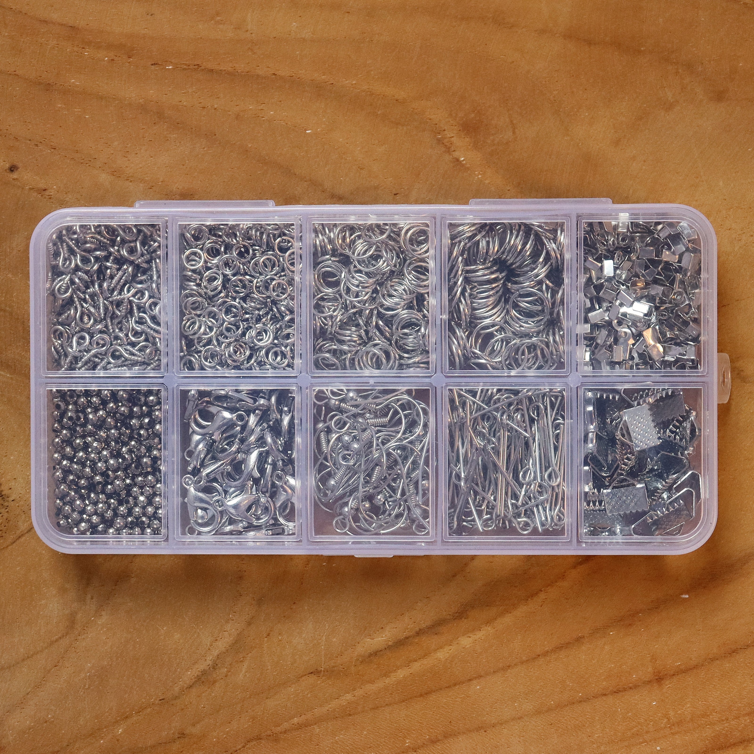 Gevulde kralendoos benodigdheden zinklegering  - zilver