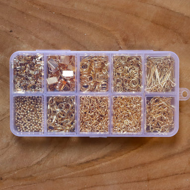 Gevulde kralendoos benodigdheden zinklegering  - goud