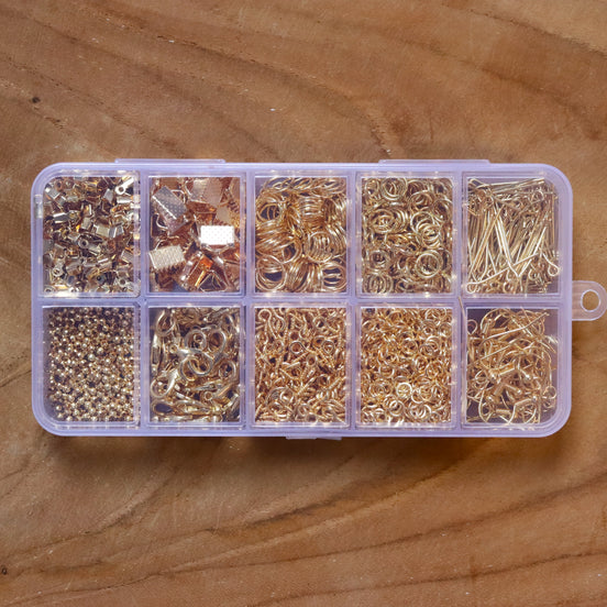 Gevulde kralendoos benodigdheden zinklegering  - goud