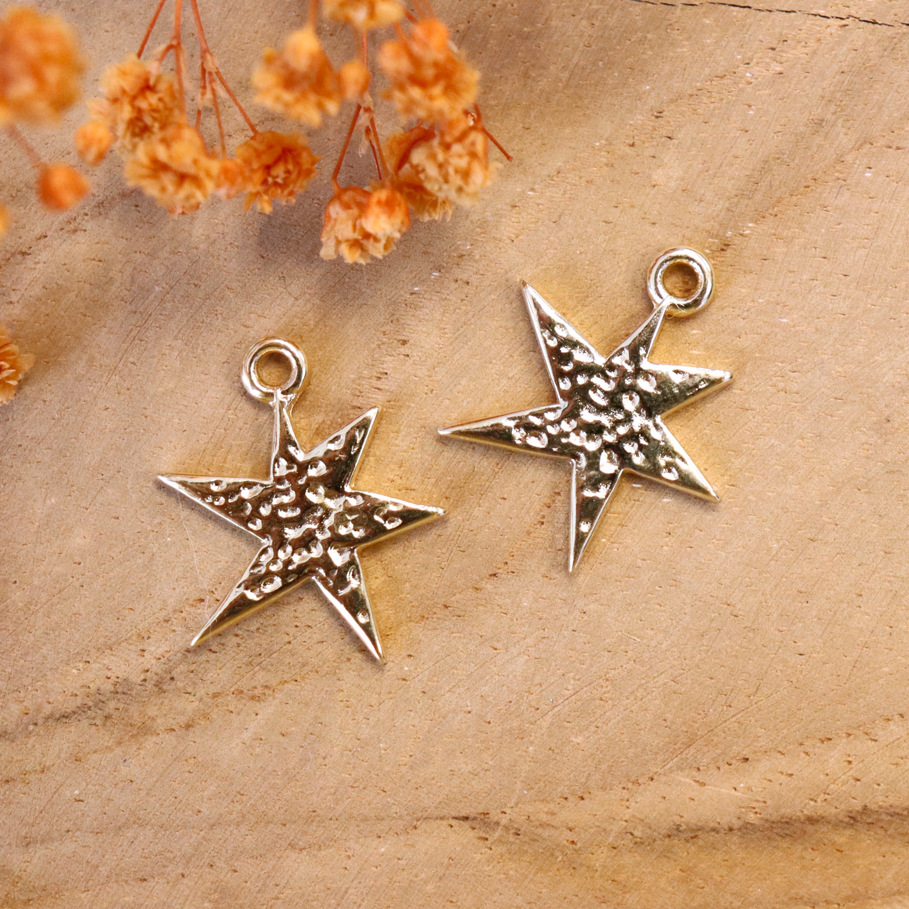 Bedel DQ GOUD asymmetrische ster met hamerslag