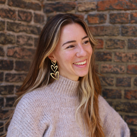 Statement oorbellen met harten goud