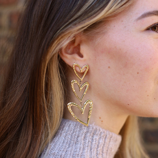 Statement oorbellen met harten goud