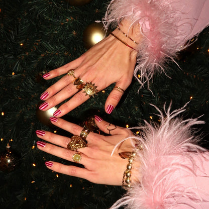 Kralenarmband - goud met bedels en jasseron