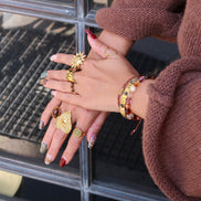 Stainless steel ring goud - zon met gezichtje